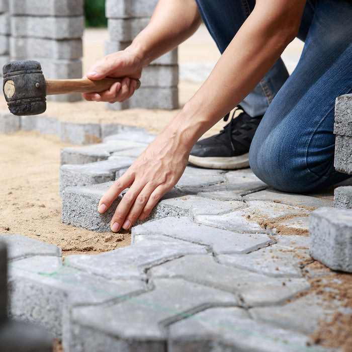 intsall & Apply Polymeric Sand to paver with mallet