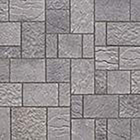 Close-up of grey interlocking pavers with the joints filled and swept clean