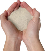 Close-up of ConSANDtrate concrete crack filler granules for repairing concrete cracks and joints.