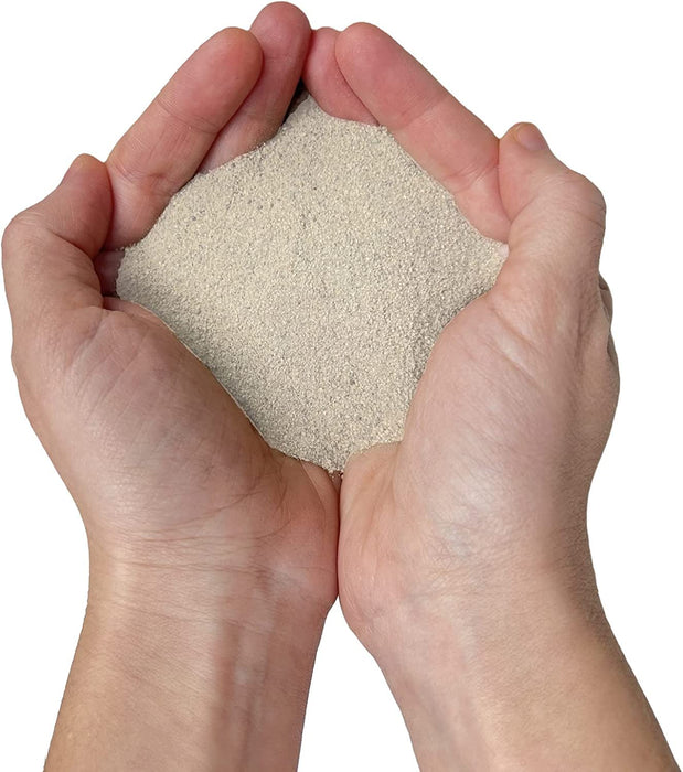 Close-up of ConSANDtrate concrete crack filler granules for repairing concrete cracks and joints.