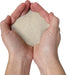 Close-up of ConSANDtrate concrete crack filler granules for repairing concrete cracks and joints.