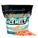 Orange Ice Melt bag with green crystal granules spilled in front, pet-safe, nature-friendly, rated to -25 degrees
