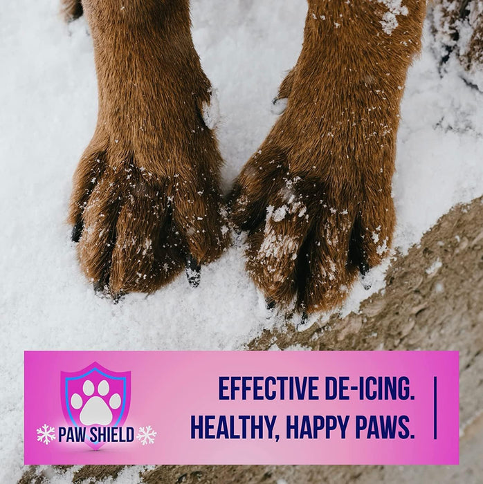 Paw Shield de-icer product ad showing golden retriever paws standing in snow with pink branded banner