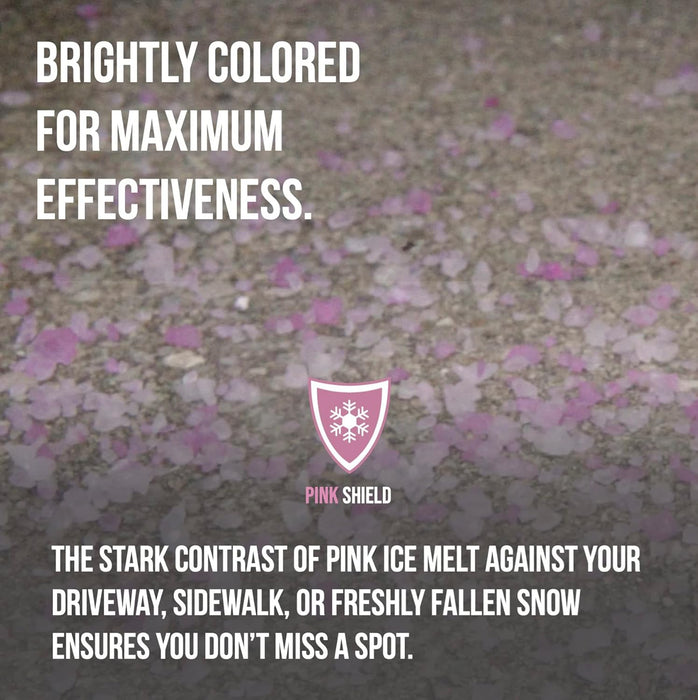 Pink Shield pink-colored ice melt crystals scattered on a concrete driveway surface