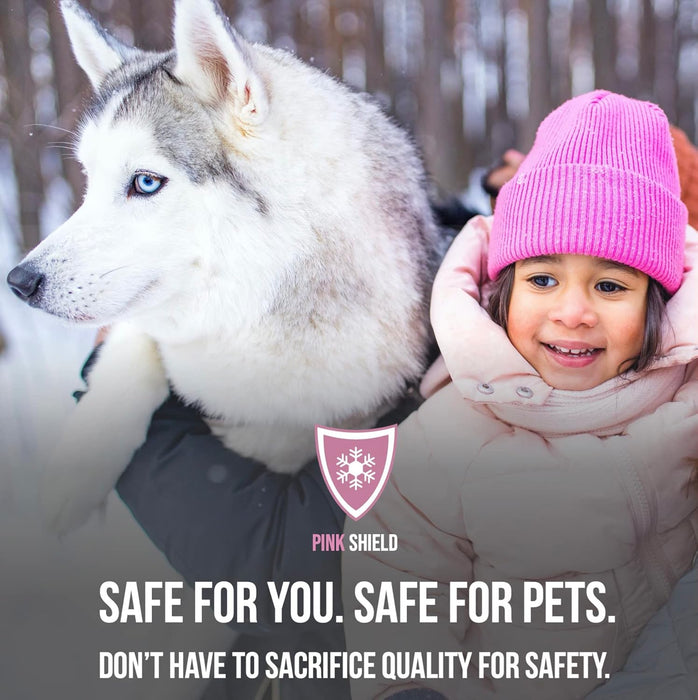 Pink Shield pet-safe ice melt promotional image with smiling child in pink hat and Siberian Husky in snowy setting