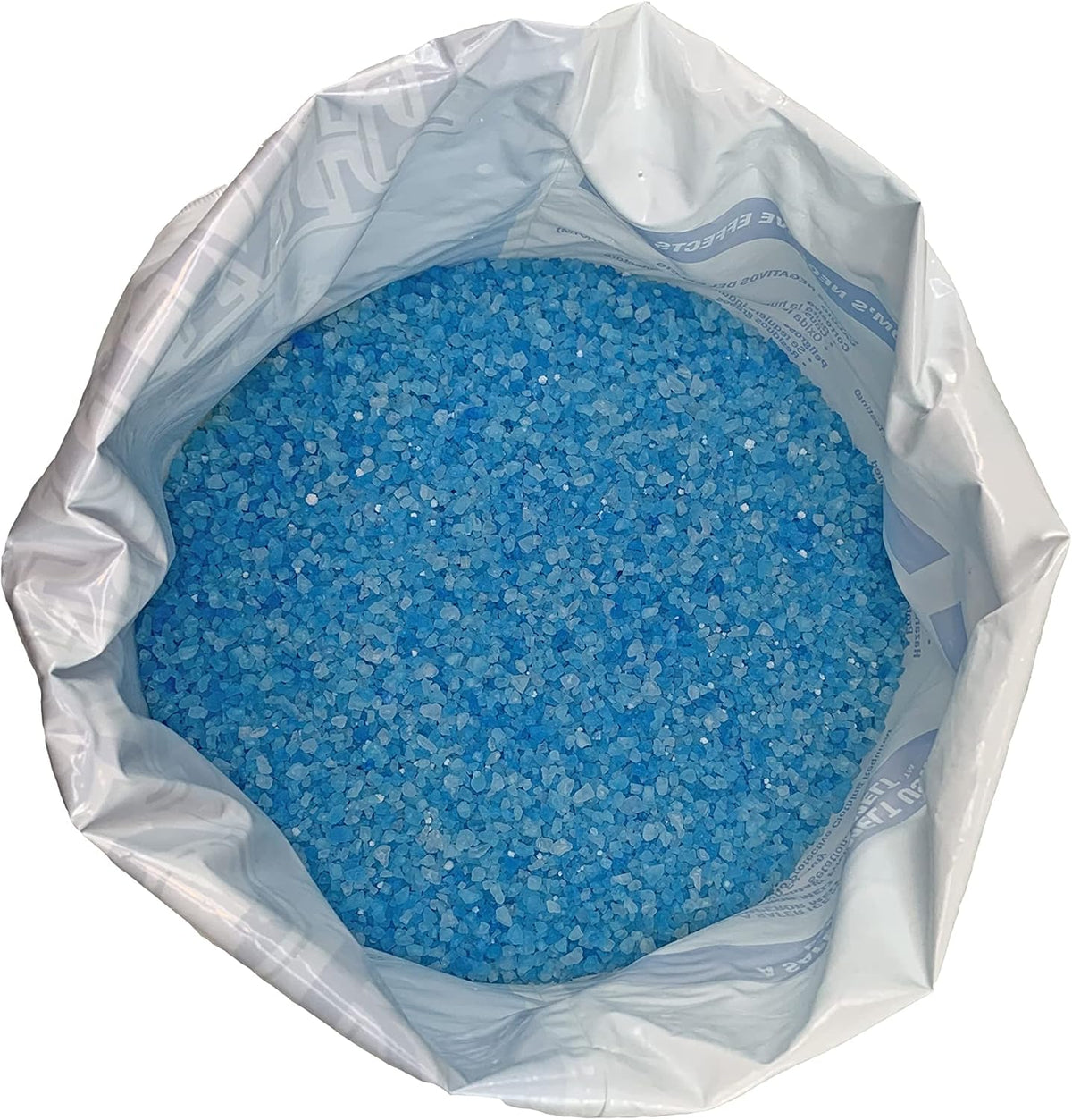 Open 50 lb bag of Blue Emperor pet safe ice melt viewed from above, blue magnesium chloride ice melter granules for driveways, sidewalks and concrete, environmentally friendly de-icer effective to -15 degrees Fahrenheit